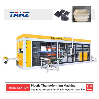 Integrovaný stroj na tvarovanie podtlakom